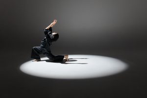 woman wearing hijab dancing