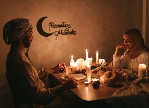 couple having a candle lit dinner