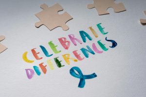 celebrate differences on white paper