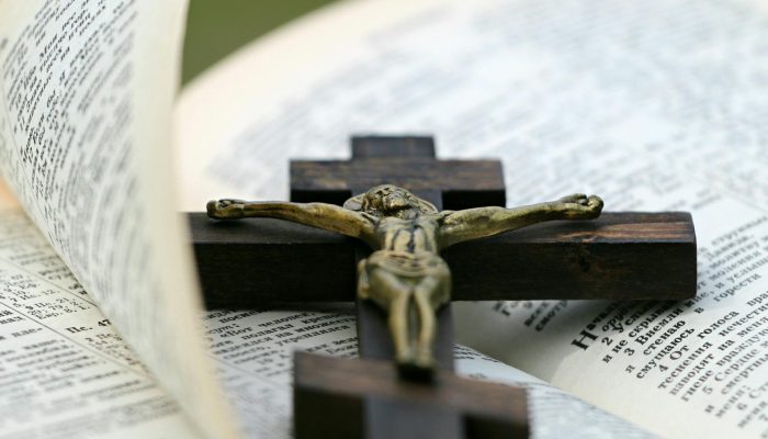 crucifix on top of bible