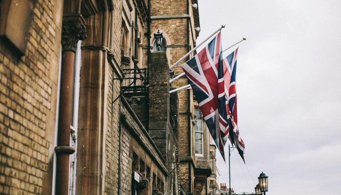 hanged flags beside building