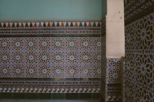 room with multicolored wall tiles