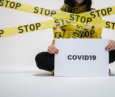 woman holding sign