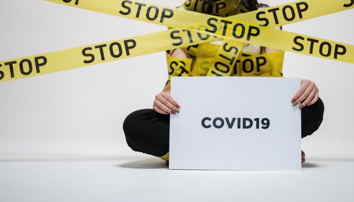 woman holding sign