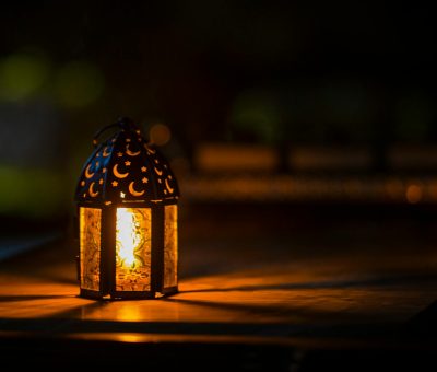 photo of ramadan light on top of table