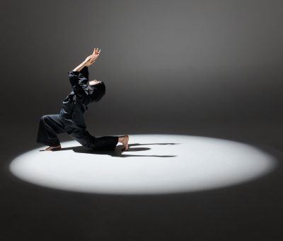woman wearing hijab dancing