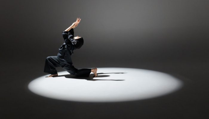 woman wearing hijab dancing