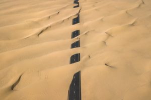 road covered with sand