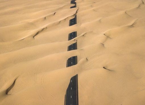road covered with sand