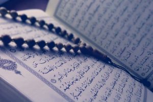 monochrome photo of quran