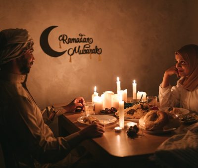 couple having a candle lit dinner