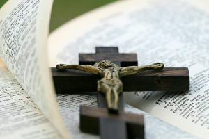 crucifix on top of bible